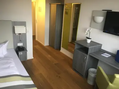 Ein Bett oder Betten in einem Zimmer der Unterkunft Hotel am Schloss