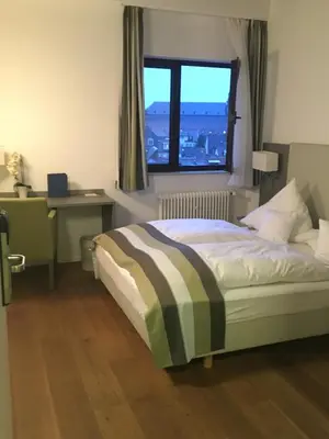 Ein Bett oder Betten in einem Zimmer der Unterkunft Hotel am Schloss