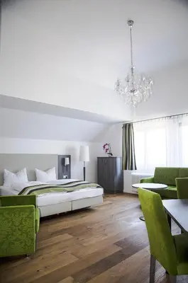 Ein Bett oder Betten in einem Zimmer der Unterkunft Hotel am Schloss