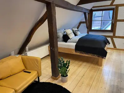 Ein Bett oder Betten in einem Zimmer der Unterkunft Hideaway im Odenwald nahe Heidelberg