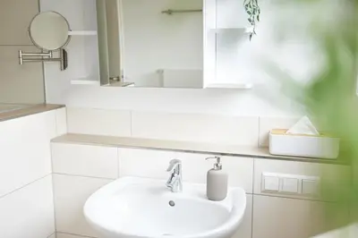 Ein Badezimmer in der Unterkunft Ajko Homes - Design Apartment - Parkplatz - Balkon - Netflix - 6 Pers