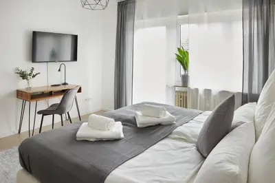 Ein Bett oder Betten in einem Zimmer der Unterkunft Ajko Homes - Design Apartment - Parkplatz - Balkon - Netflix - 6 Pers