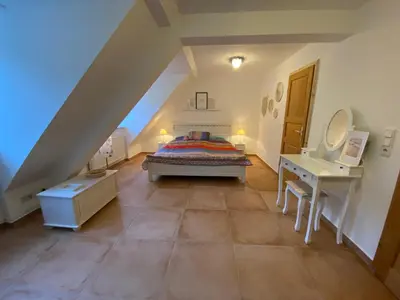Ein Bett oder Betten in einem Zimmer der Unterkunft Felsenmühle Neuleiningen