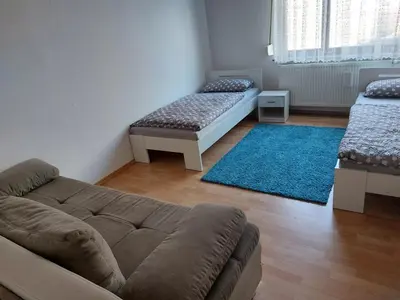 Ein Bett oder Betten in einem Zimmer der Unterkunft Ferienwohnung Enz