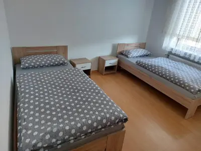 Ein Bett oder Betten in einem Zimmer der Unterkunft Ferienwohnung Enz
