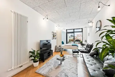 Ein Sitzbereich in der Unterkunft Lit Living - Luxus Loft - Box Spring - Air Con - BBQ - Panorama