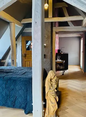 Ein Bett oder Betten in einem Zimmer der Unterkunft Vintner Suites