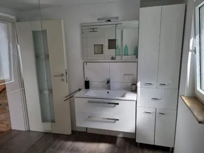 Ein Badezimmer in der Unterkunft Ferienhaus am Park