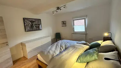 Ein Bett oder Betten in einem Zimmer der Unterkunft Heimatliebe Erfweiler Wohnung DREI