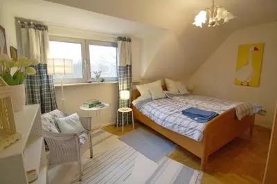 Ein Bett oder Betten in einem Zimmer der Unterkunft Ferienwohnung 11 mit großer Terrasse am Privatsee