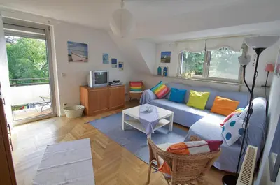 Ein Sitzbereich in der Unterkunft Ferienwohnung 11 mit großer Terrasse am Privatsee