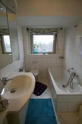 Ein Badezimmer in der Unterkunft Ferienwohnung 11 mit großer Terrasse am Privatsee