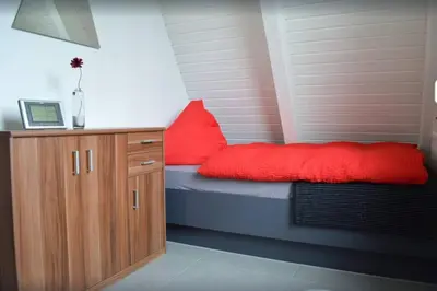 Ein Sitzbereich in der Unterkunft Ferienhaus in Waldkatzenbach modern & renoviert