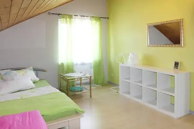 Ein Bett oder Betten in einem Zimmer der Unterkunft Ferienwohnung Kirschenlohr