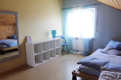 Ein Bett oder Betten in einem Zimmer der Unterkunft Ferienwohnung Kirschenlohr