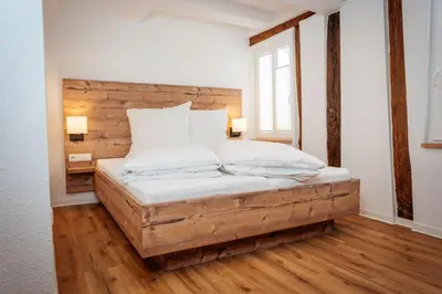Ein Bett oder Betten in einem Zimmer der Unterkunft Bauernhäusle