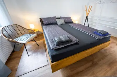 Ein Bett oder Betten in einem Zimmer der Unterkunft Haus Sebald